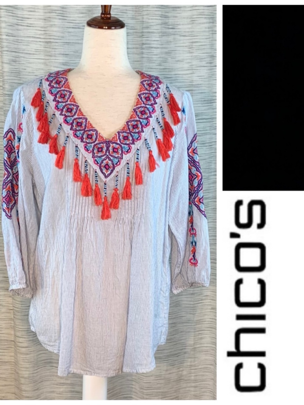Chico’s pin striped and embroidered top.